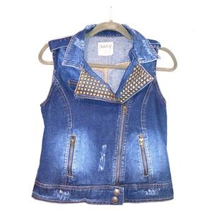 Studded jean vest.